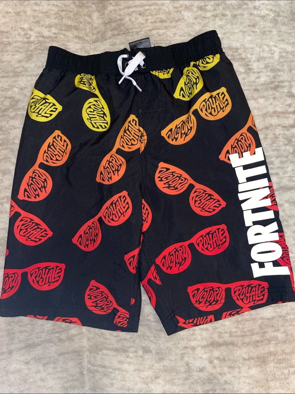 Fortnite Boys Black Swim Trunks with Red & Yellow Gradient Print